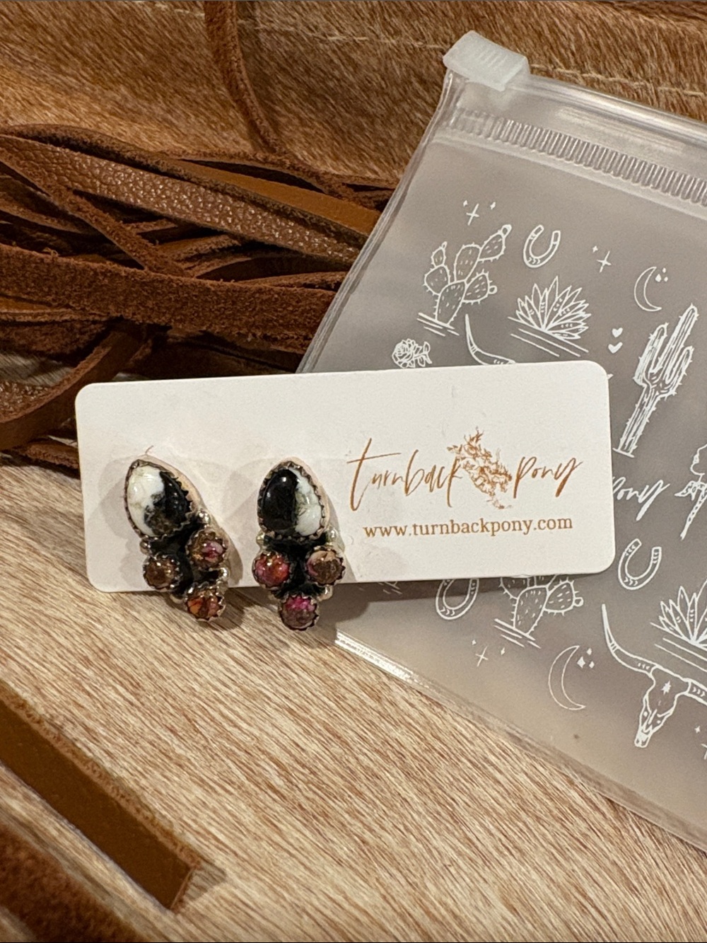 Turnback Pony earrings